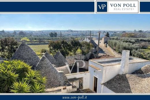 image of houses and street with von poll header on it