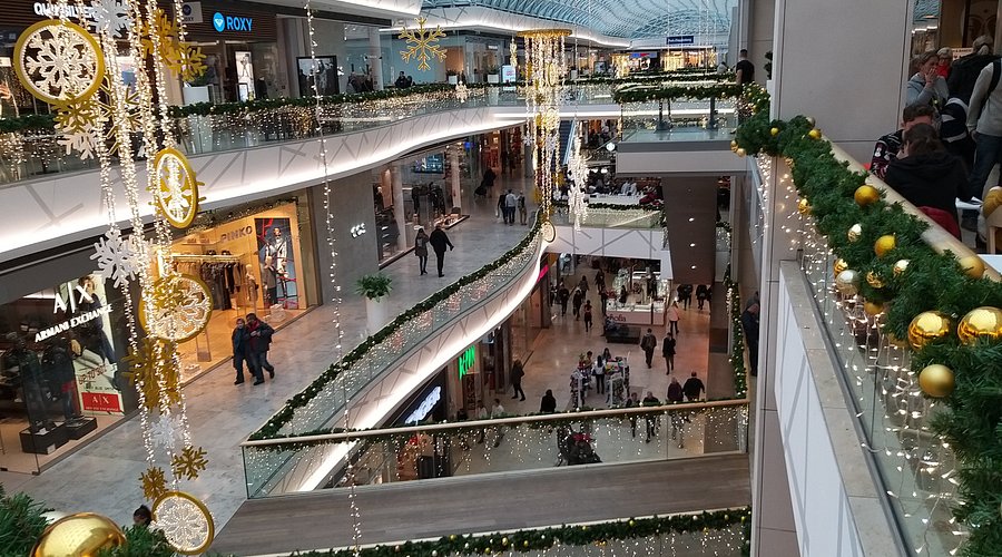 eurovea tower image form inside the mall where people walking and enjoying