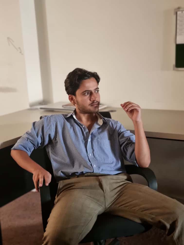 ubaid ur rahman founder of acorn thrive in his office
